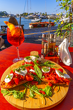 View of Italian Bruschetta at restaurant in Porto d'Ischia (Port of Ischia), Island of Ischia, Campania, Italy, Europe