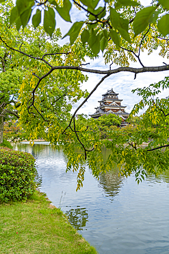 View of Hiroshima Castle, with museum, reflecting in Moat, Motomachi, Naka Ward, Hiroshima, Japan, Asia