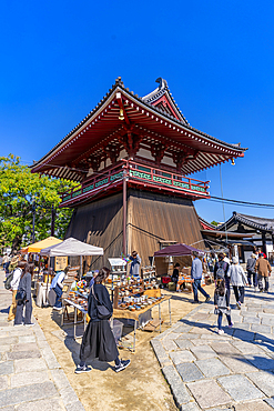 View of market stalls and Kita-indogane-do on a sunny day, Shitennoji, Tennoji Ward, Osaka, Honshu, Japan, Asia