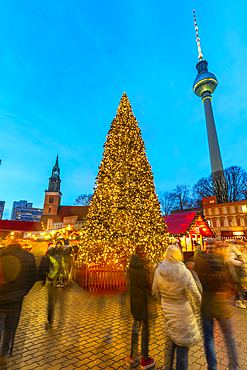 View of Berlin TV Tower and Christmas tree in Wasserkaskaden at dusk, Mitte, Berlin, Germany, Europe