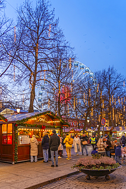 View of Christmas market and ferris wheel on Karl Johans Gate at dusk, Oslo, Norway, Scandinavia, Europe