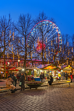 View of Christmas market and ferris wheel on Karl Johans Gate at dusk, Oslo, Norway, Scandinavia, Europe