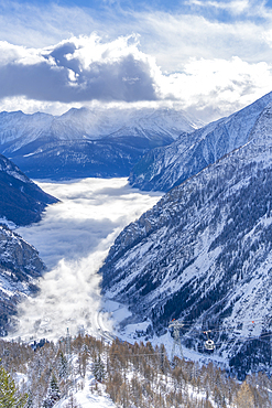 View of snow covered Aosta Valley from Pavillon du Mont Fréty in winter, Courmayeur, Aosta Valley, Italy, Europe