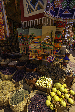 View of colourful market stalls at Nagaa Suhayl Gharb on the Nile river near Aswan, Aswan, Nubia, Egypt, North Africa, Africa