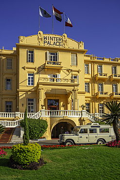View of the Winter Palace Hotel on the corniche in Luxor on a sunny day, Luxor, Egypt, Africa