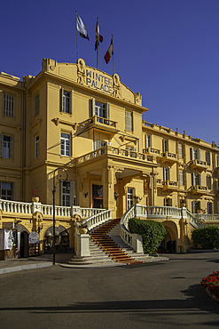 View of the Winter Palace Hotel on the corniche in Luxor on a sunny day, Luxor, Egypt, Africa