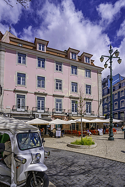 View of colourful architecture and cafes in PC Duque da Terceira on a sunny day, Lisbon, Portugal, Europe
