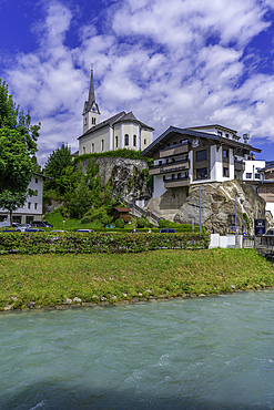 View of Kaprun town and church on the hill on a sunny day, Kaprun, Salzburg, Austria, Europe