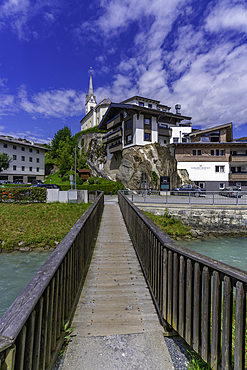 View of Kaprun town and church on the hill on a sunny day, Kaprun, Salzburg, Austria, Europe