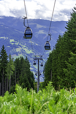 View of cable car at Mittelstation on a sunny day, Bruckberg, Salzburg, Austria, Europe
