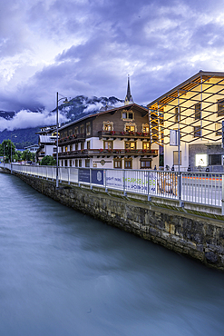 View of town and river in Kaprun at dusk during summer, Kaprun, Zell am See, Salzburg, Austria, Europe