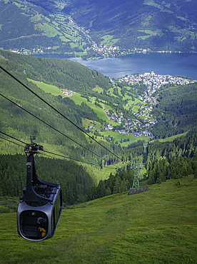 View of cable car, Zell am See and cloud from Schmittenhöhebahn top station 2000m on a sunny day, Zell am See, Salzburg, Austria, Europe