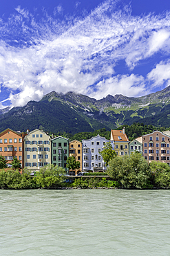 View of colourful buildings and River Inn on a sunny day in summer, Innsbruck, Tyrol Region, Austria, Europe