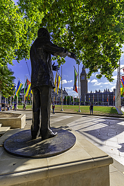 View of Nelson Mandella statue and Big Ben clock tower in Parliament Square during summer, Westminster, London, England, United Kingdom, Europe