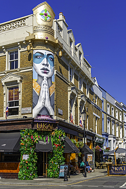 View of colourful shops in Portobello Road during summer, Kensington, London, England, United Kingdom, Europe