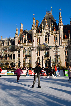 Christmas Ice Rink in the Market Square, Bruges, West Vlaanderen (Flanders), Belgium, Europe