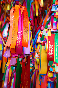 Good luck ribbons for offering at the Kek Lok Si Temple, Crane Hill, Georgetown, Pulau Penang, Malaysia, Southeast Asia, Asia