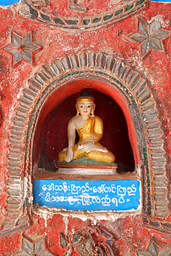 Buddha offerings in wall niche, Shwe Yan Pyay monastery, Nyaungshwe, Inle Lake, Shan State, Myanmar (Burma), Asia