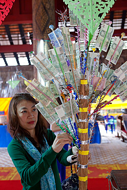 Offerings at the Wat Phra That Lampang Luang Buddhist temple, Lampang, Northern Thailand, Thailand, Southeast Asia, Asia