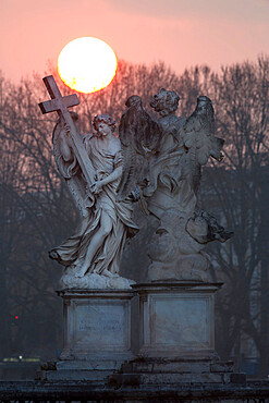 Bernini's breezy maniac angels statues on the Ponte Sant'Angelo at sunrise, Rome, Lazio, Italy, Europe