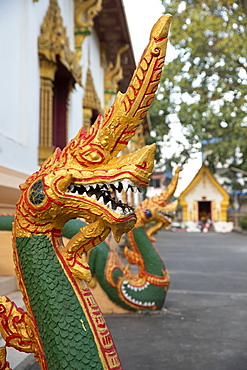 Naga guardian at the Wat Inpeng Buddhist temple, Rue Samsenthai, Vientiane, Laos, Indochina, Southeast Asia, Asia