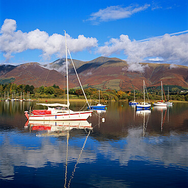 Yachts moored in Derwent Water in autumn morning sunlight, Keswick, Lake District, UNESCO World Heritage Site, Cumbria, England, United Kingdom, Europe