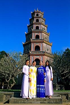 Thien Mu Pagoda (Pagoda of the Heavenly Lady) with local girls, Hue, UNESCO World Heritage Site, North Central Coast, Vietnam, Indochina, Southeast Asia, Asia