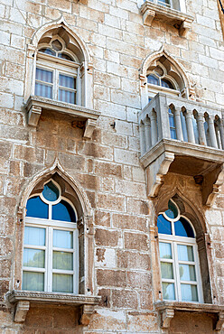 Window arches in old town, Porec, Istria, Croatia, Europe