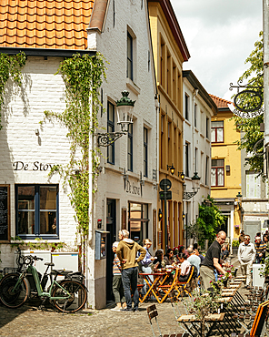 Restaurant with people dining outdoors, Bruges, Belgium