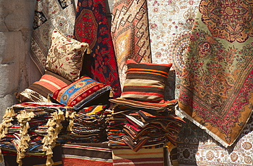 Turkey, Istanbul, Grand Bazaar, rugs and cushions for sale