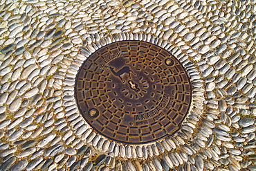 Greece, Rhodes, Manhole cover with symbol of Rhodes