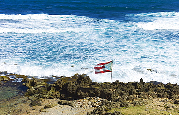 Puerto Rico, Old San Juan, flag of Puerto rice on sea coast