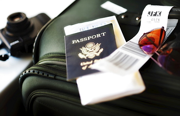 Close up of passport and travel accessories