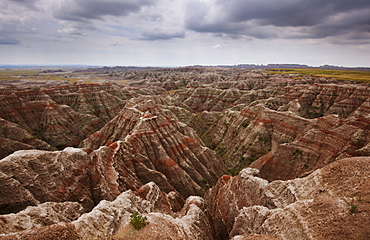 USA, South Dakota, Thick gray clouds over mountains in Badlands National Park