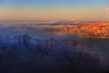 USA, South Dakota, Mountains in Badlands National Park at sunset