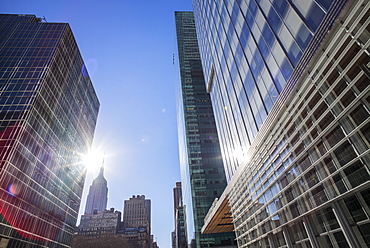 Skyscrapers with solar flare, New York City, USA