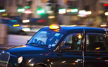 UK, London, Black cab at night, UK, London