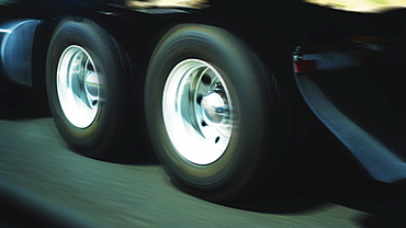 Wheels of truck in motion