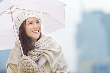 Portrait of woman with umbrella
