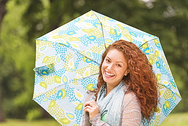 Portrait of young woman in park