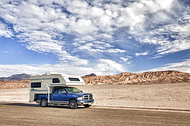 USA, California, Death Valley, truck camper on road, USA, California, Death Valley