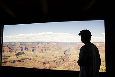 Silhouette of man on boxcar