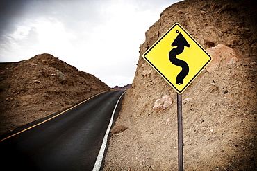 USA, California, Death Valley, road sign with empty road, USA, California, Death Valley