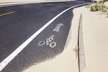 Oregon, Florence, Bike lane partially covered in snow, Florence, Oregon