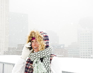 Jersey City, New Jersey, portrait of woman talking on mobile phone