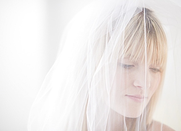 USA, New Jersey, Jersey City, young woman wearing white veil