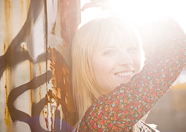 USA, Brooklyn, Williamsburg, Portrait of blonde woman in backlit