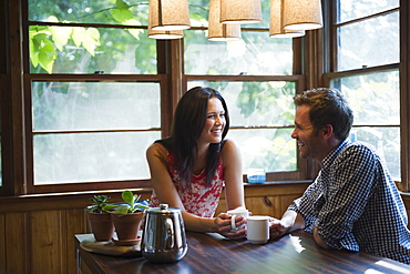 Roaring Brook Lake, Couple sitting at table