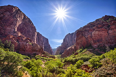 Sun shining over majestic mountain landscape, Utah