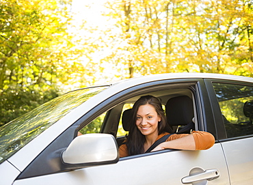 Woman driving car, Newtown, Connecticut